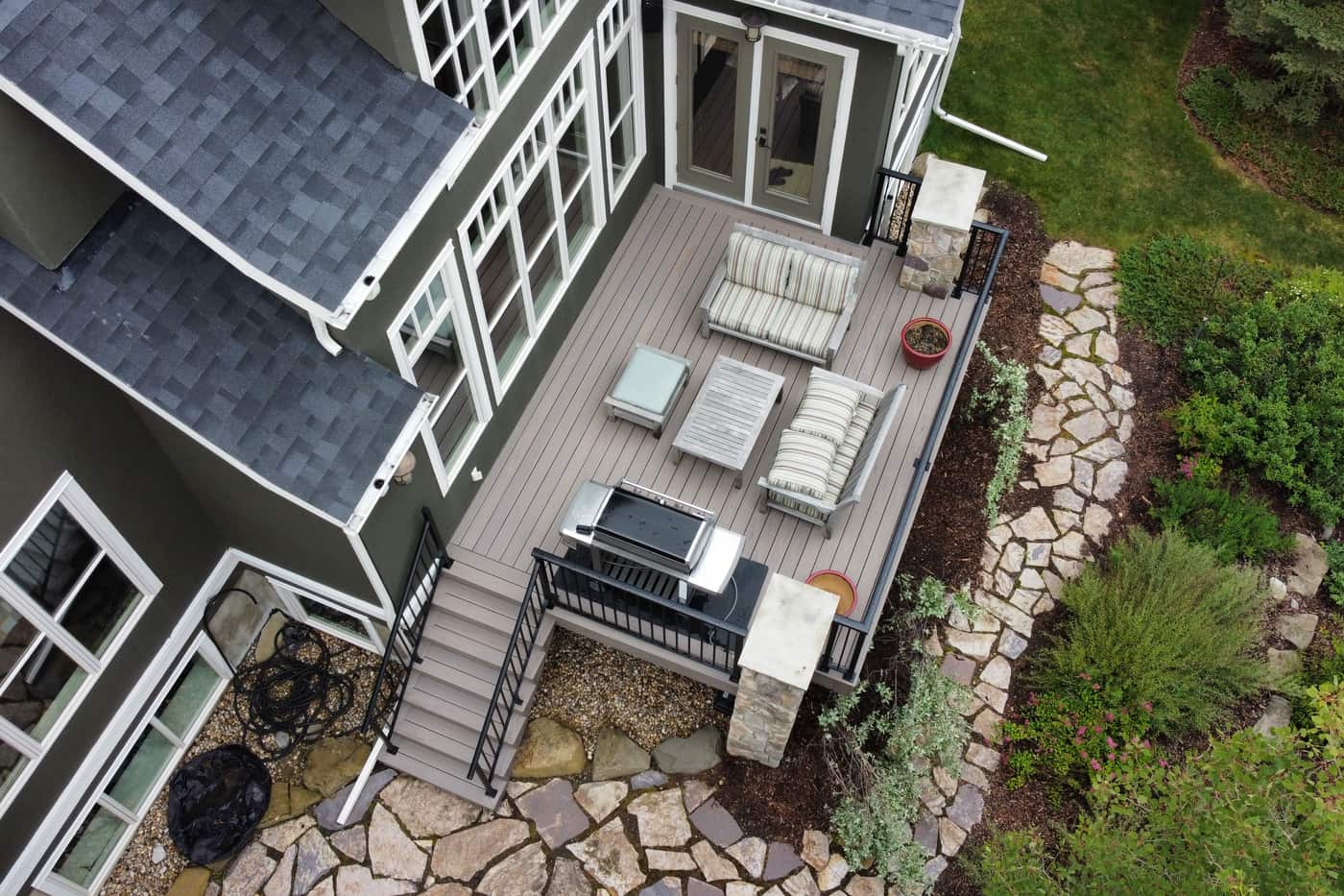Aerial view of a custom residential deck and outdoor living space built by National Fence & Deck in Calgary and area.