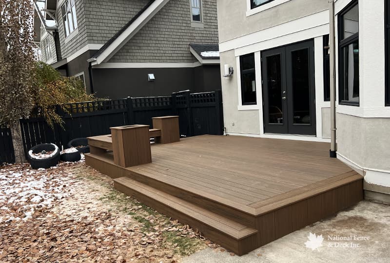 Trex Toasted Sand deck with custom built bench seat and planter boxes.