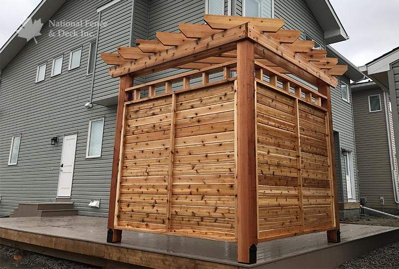 Beautiful cedar pergola in deck corner