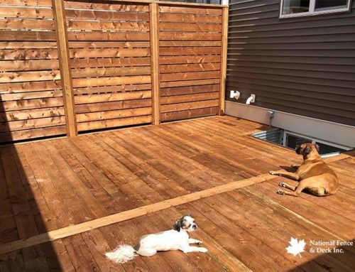 Deck Featuring A Matching Wood Privacy Wall