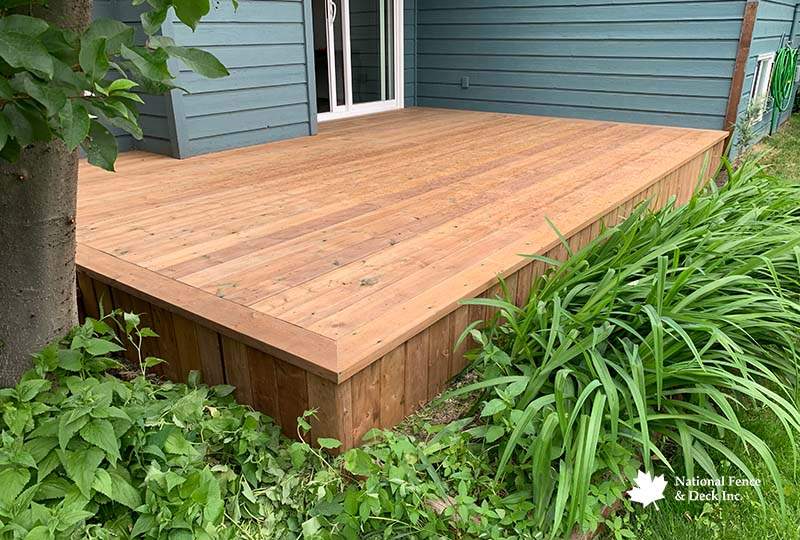 Wood Deck Showcasing Matching Skirting